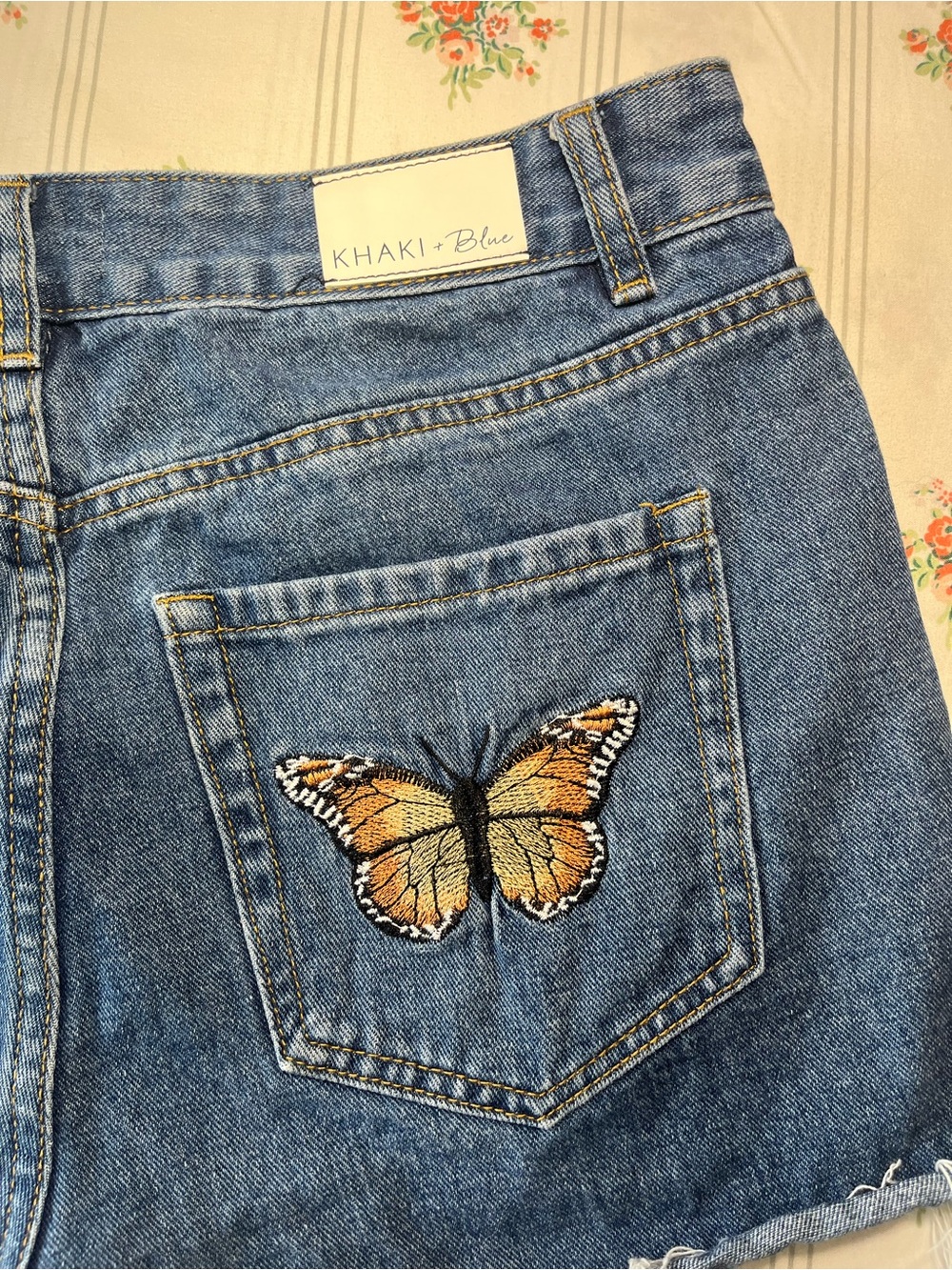 Khaki Blue Women's Blue Denim Shorts with Embroidered Orange Butterfly